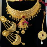 SUHASNA - Gold-Ruby Choker with matching earrings and bindi